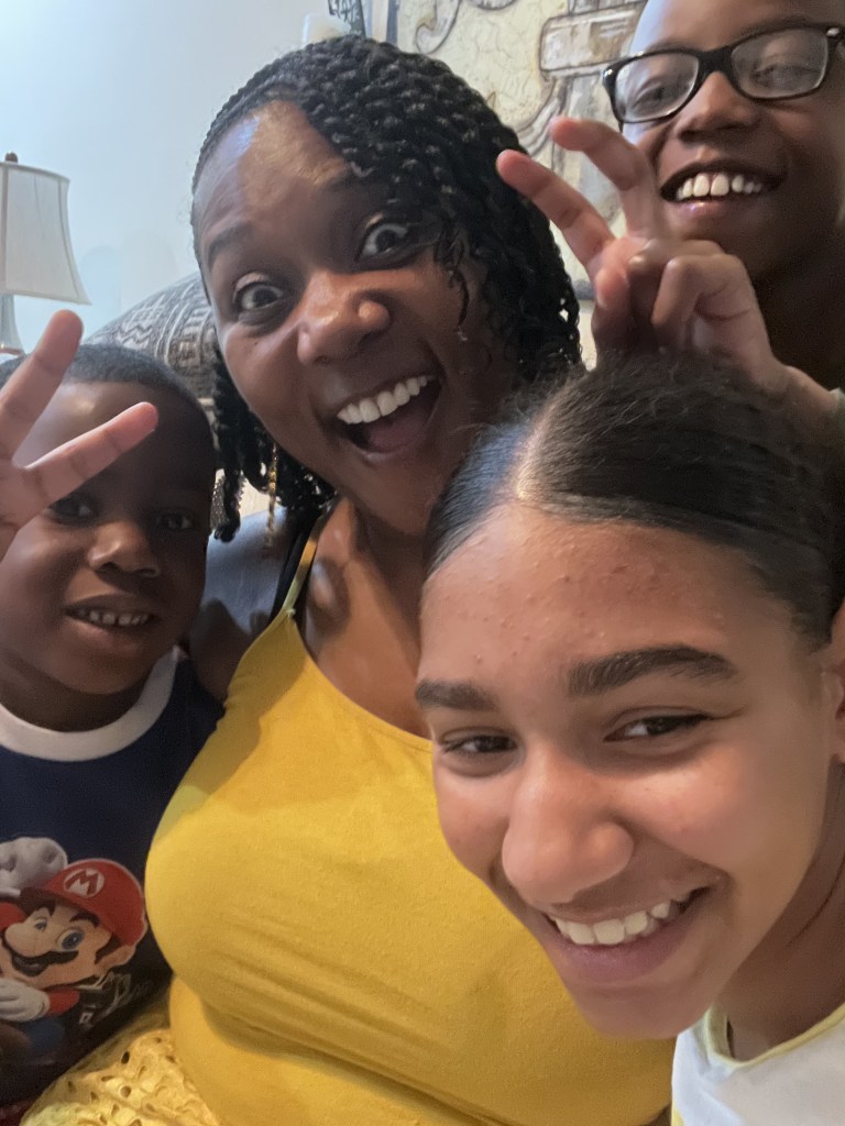 Stanley and Ronnie, along with Anasia in PJs for a special neighbor storytime, games, and pizza. 